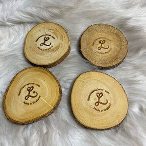 Lipper International Acacia Tree Barks set of four coasters .